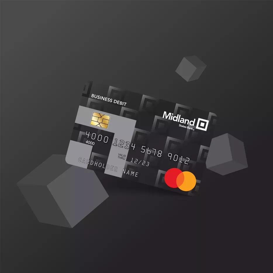 midland business debit card on black background
